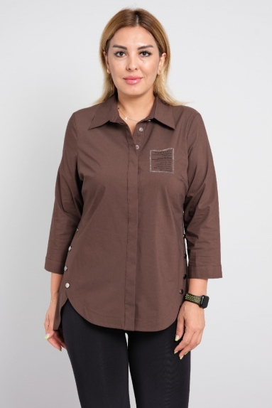 Women's shirt with text print and button detail on the sides