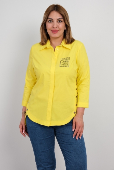  For plus size women, a yellow shirt with button details on the sides, long sleeves, and stone embroidery on the front and back.