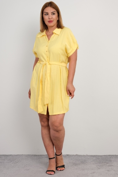  For plus size women, a yellow knee-length elegant and stylish dress with button detail on the front, short sleeves, and belt detail in fine fabric.
